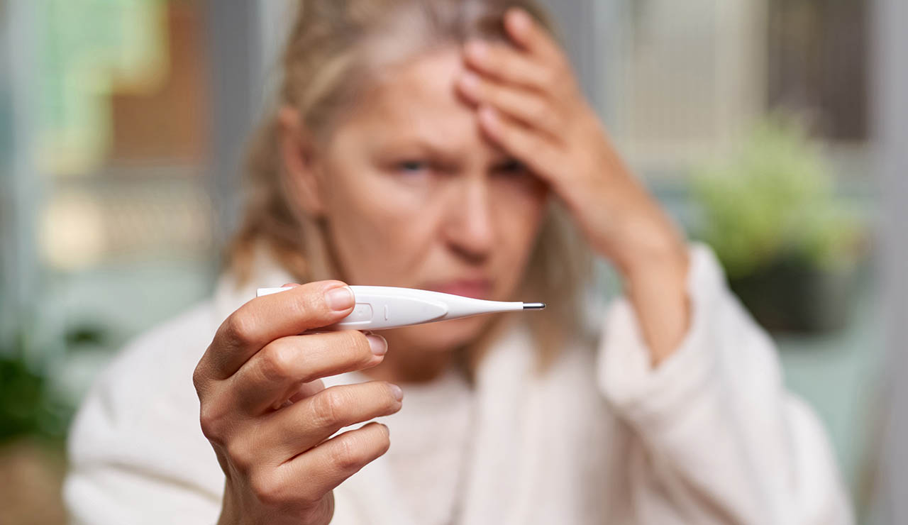 Mujer con fiebre